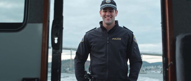Corporate Video Production - Tasmania Police Officer on Boat