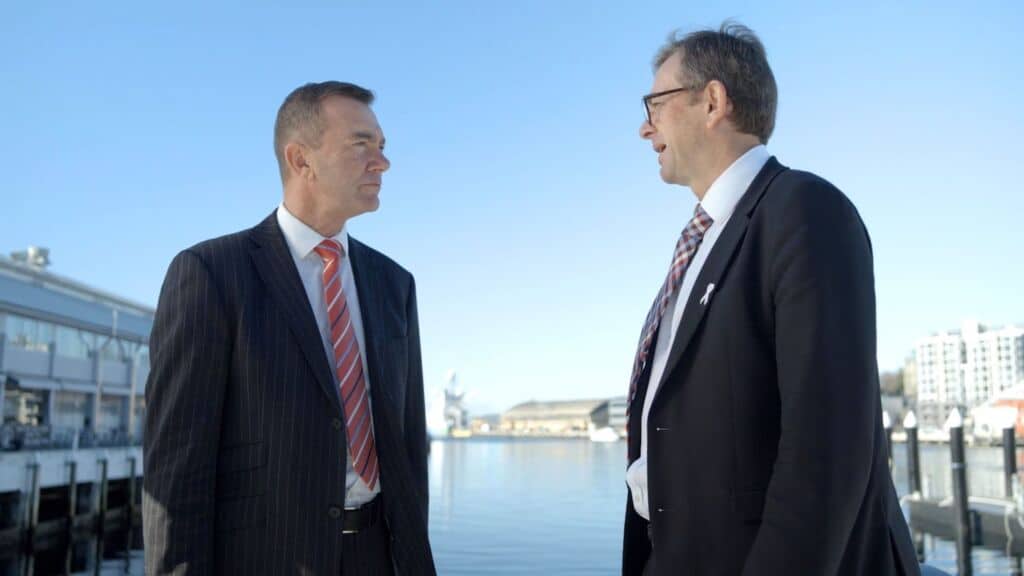 Two Government Public Servants Talking During a Government Video Production